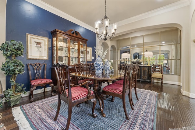 135 Penns Way, Shavano Park, TX 78231 - dining area with arched walkways, ornamental molding, a chandelier, baseboards, and wood-type flooring
