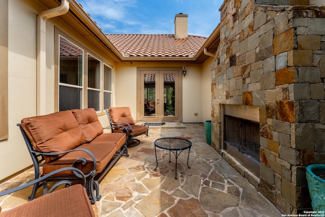 135 Penns Way, Shavano Park, TX 78231 - view of patio / terrace with french doors and an outdoor living space with a fireplace