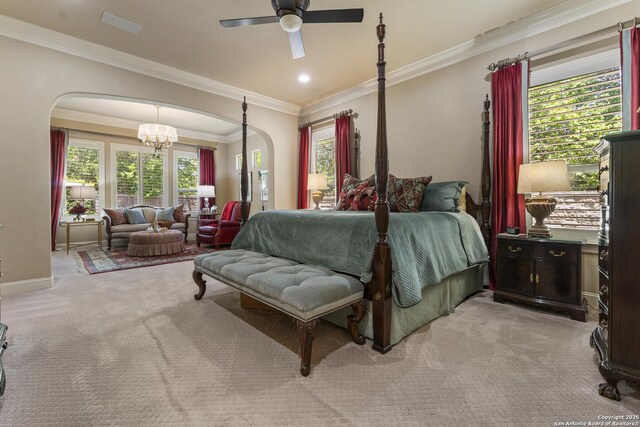 135 Penns Way, Shavano Park, TX 78231 - bedroom featuring arched walkways, light colored carpet, multiple windows, crown molding, and baseboards