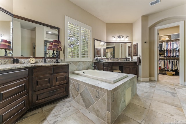 135 Penns Way, Shavano Park, TX 78231 - full bathroom with a garden tub, vanity, and a spacious closet
