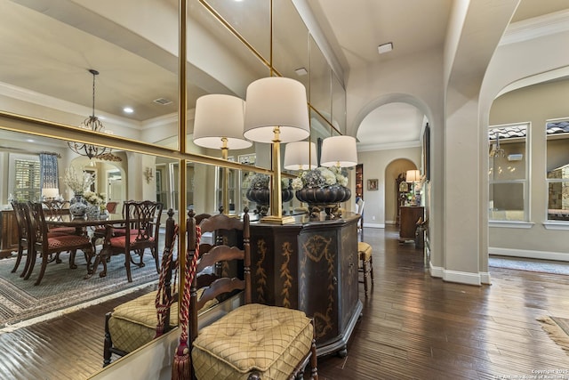 135 Penns Way, Shavano Park, TX 78231 - dining space featuring arched walkways, baseboards, healthy amount of natural light, hardwood / wood-style floors, and ornamental molding