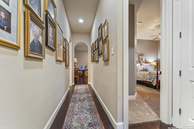 135 Penns Way, Shavano Park, TX 78231 - hallway with arched walkways, wood finished floors, and baseboards
