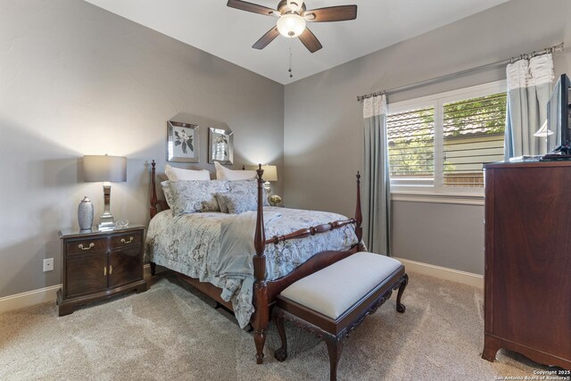 135 Penns Way, Shavano Park, TX 78231 - bedroom with light carpet, baseboards, and ceiling fan
