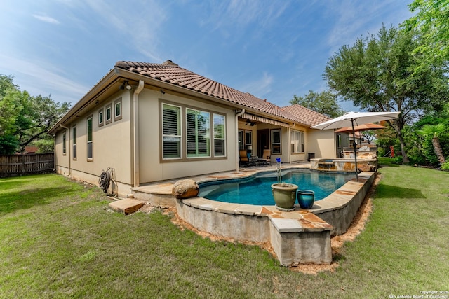 135 Penns Way, Shavano Park, TX 78231 - rear view of property with a ceiling fan, a tiled roof, a patio area, stucco siding, and a pool with connected hot tub