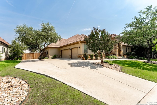 135 Penns Way, Shavano Park, TX 78231 - view of front of property featuring an attached garage, a tiled roof, stucco siding, and driveway