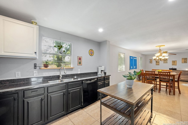 25 Zoeller Ln, Boerne, TX 78006 - kitchen with a sink, black dishwasher, white cabinetry, light tile patterned floors, and plenty of natural light