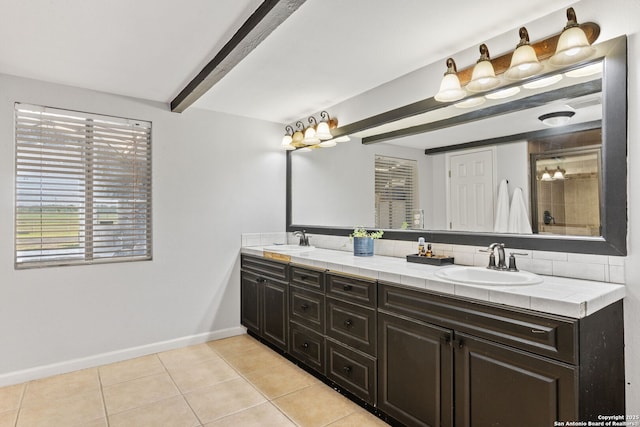 25 Zoeller Ln, Boerne, TX 78006 - full bath featuring tile patterned flooring, baseboards, double vanity, and tiled shower