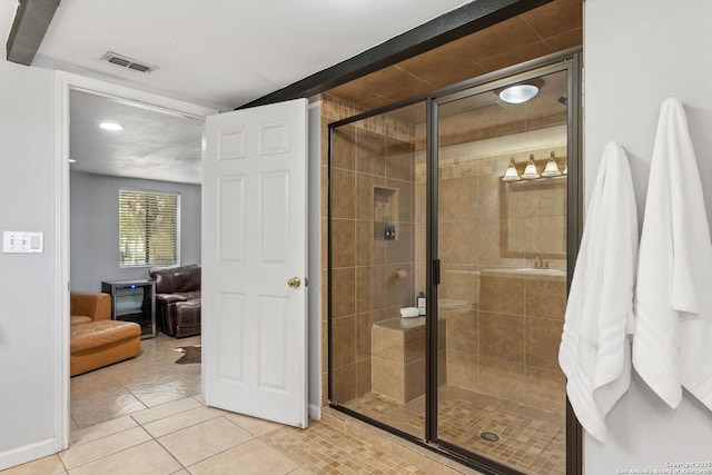 25 Zoeller Ln, Boerne, TX 78006 - ensuite bathroom featuring tile patterned floors and a shower stall