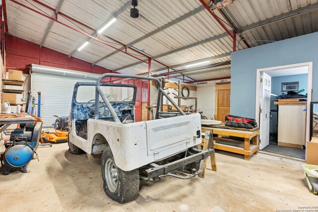 25 Zoeller Ln, Boerne, TX 78006 - garage featuring a workshop area