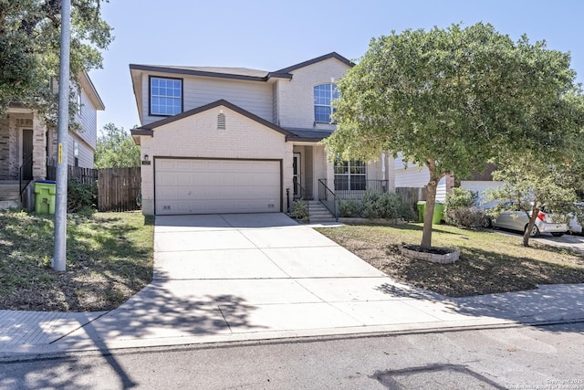 1427 Alaskan Wolf, San Antonio, TX 78245 - traditional-style home with brick siding, concrete driveway, and a garage