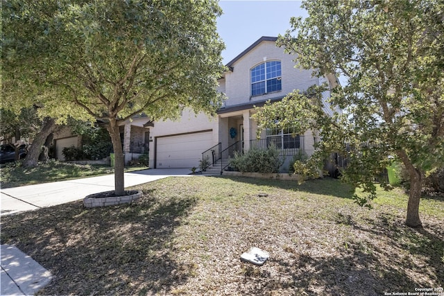1427 Alaskan Wolf, San Antonio, TX 78245 - obstructed view of property with concrete driveway, a garage, brick siding, and a porch