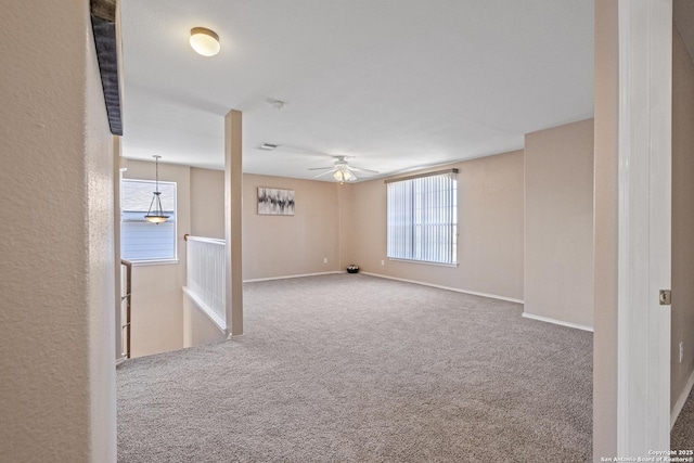1427 Alaskan Wolf, San Antonio, TX 78245 - carpeted empty room with healthy amount of natural light, a ceiling fan, and baseboards