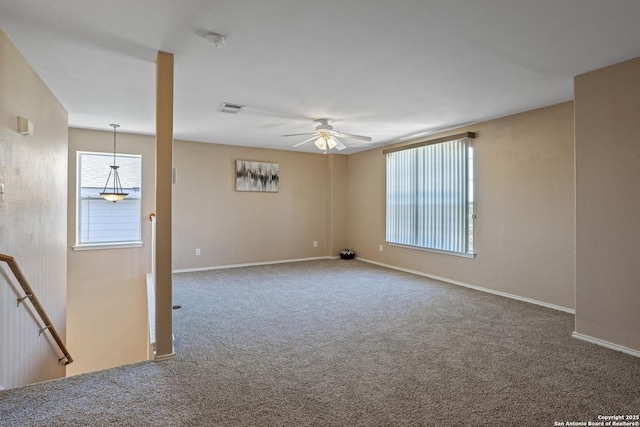 1427 Alaskan Wolf, San Antonio, TX 78245 - carpeted spare room featuring a ceiling fan, healthy amount of natural light, a smoke detector, and baseboards
