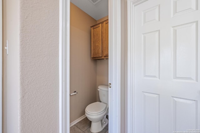 1427 Alaskan Wolf, San Antonio, TX 78245 - bathroom with tile patterned floors and toilet