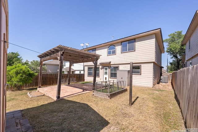 1427 Alaskan Wolf, San Antonio, TX 78245 - back of property featuring central air condition unit, a pergola, and a patio
