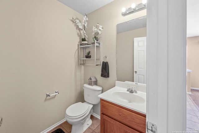 1427 Alaskan Wolf, San Antonio, TX 78245 - bathroom featuring tile patterned flooring, vanity, toilet, and baseboards