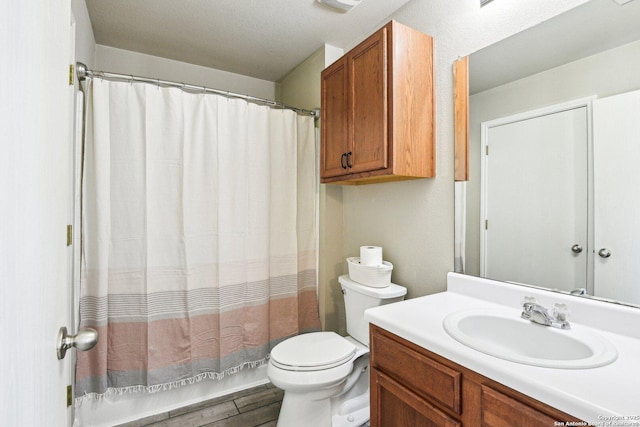 6438 Candleview Ct, San Antonio, TX 78244 - bathroom with toilet, wood finished floors, and vanity