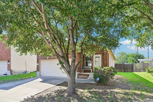 6438 Candleview Ct, San Antonio, TX 78244 - obstructed view of property featuring concrete driveway and brick siding