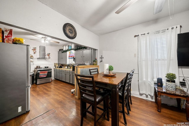 2332 Houston, San Antonio, TX 78202 - dining room with a ceiling fan, dark wood finished floors, and lofted ceiling