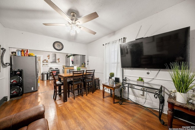 2332 Houston, San Antonio, TX 78202 - dining area with wood finished floors and a ceiling fan