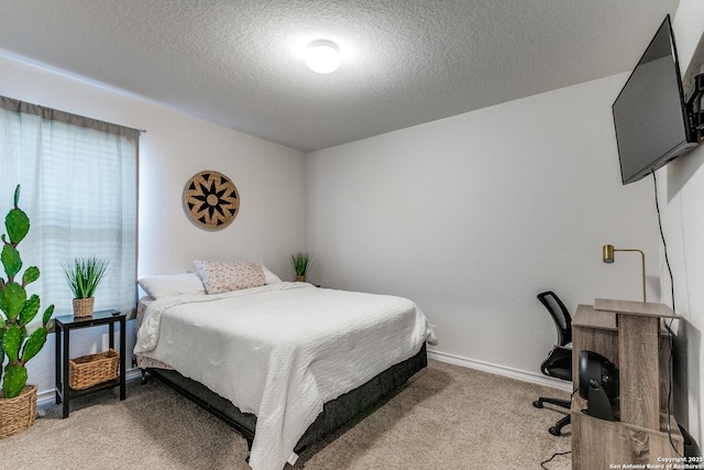 9614 Tupelo Holw, San Antonio, TX 78254 - bedroom featuring carpet, a textured ceiling, and baseboards