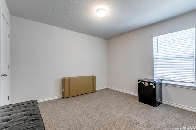9614 Tupelo Holw, San Antonio, TX 78254 - unfurnished bedroom featuring carpet and baseboards