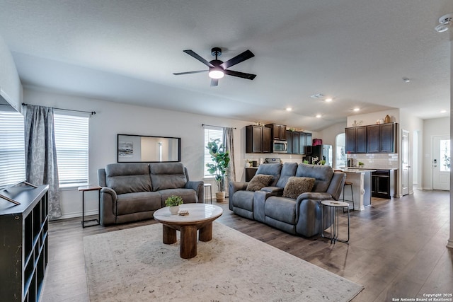 9614 Tupelo Holw, San Antonio, TX 78254 - living area featuring wood finished floors, ceiling fan, vaulted ceiling, and recessed lighting