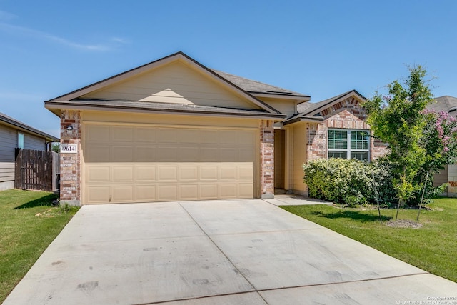 9614 Tupelo Holw, San Antonio, TX 78254 - view of front of property with brick siding, driveway, a front lawn, and an attached garage
