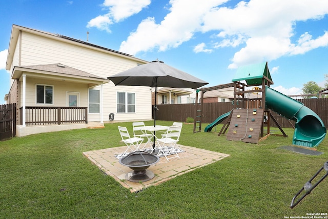 12890 Limestone Way, San Antonio, TX 78253 - rear view of house featuring a playground, a patio area, and an outdoor fire pit