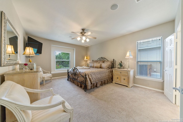 26019 Meadowlark Bay, San Antonio, TX 78260 - bedroom with light colored carpet, baseboards, and ceiling fan