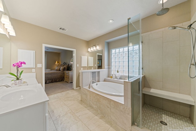26019 Meadowlark Bay, San Antonio, TX 78260 - full bathroom with ensuite bathroom, a garden tub, tiled shower, and double vanity