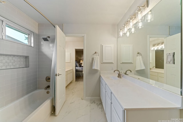 26019 Meadowlark Bay, San Antonio, TX 78260 - full bathroom with marble look tiles, shower / bath combination, ensuite bathroom, vanity, and baseboards