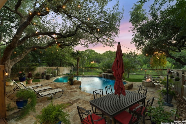 26019 Meadowlark Bay, San Antonio, TX 78260 - view of pool featuring an outdoor fire pit, a fenced backyard, a patio area, and outdoor dining space