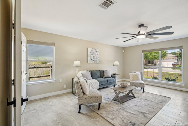 7230 Sunrise Lk, San Antonio, TX 78244 - living room featuring a ceiling fan and baseboards