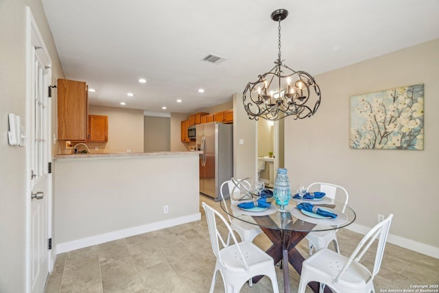 7230 Sunrise Lk, San Antonio, TX 78244 - dining space featuring recessed lighting, a chandelier, baseboards, and light tile patterned floors