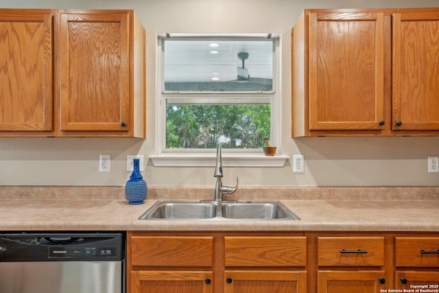 7230 Sunrise Lk, San Antonio, TX 78244 - kitchen with stainless steel dishwasher, a sink, and light countertops