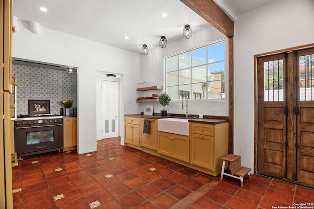 241 W Elsmere, San Antonio, TX 78212 - kitchen with range with gas cooktop, a sink, healthy amount of natural light, dark countertops, and recessed lighting