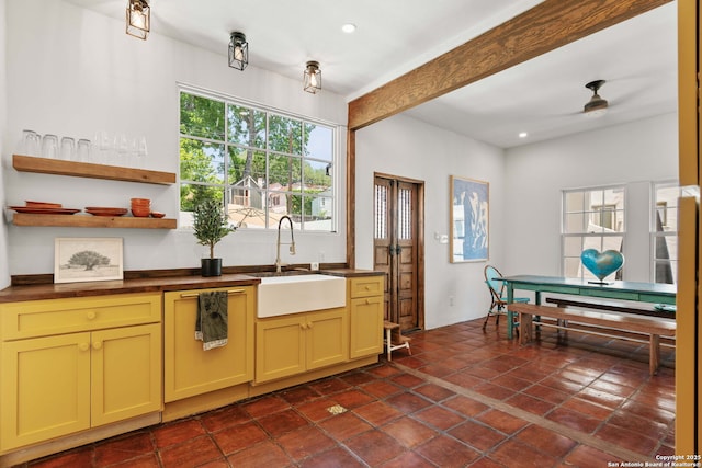 241 W Elsmere, San Antonio, TX 78212 - kitchen with a sink, a ceiling fan, recessed lighting, dark tile patterned floors, and open shelves