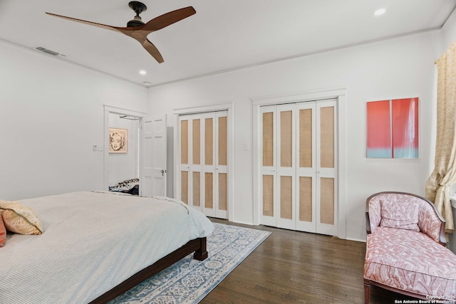 241 W Elsmere, San Antonio, TX 78212 - bedroom with dark wood-style floors, recessed lighting, two closets, and ceiling fan