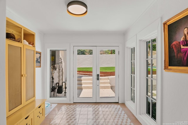 241 W Elsmere, San Antonio, TX 78212 - mudroom with french doors and light tile patterned floors