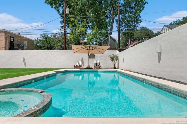 241 W Elsmere, San Antonio, TX 78212 - view of swimming pool with a pool with connected hot tub and a fenced backyard