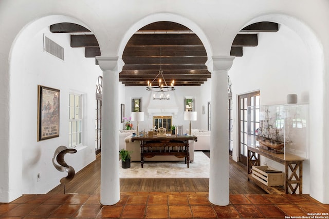 241 W Elsmere, San Antonio, TX 78212 - hallway featuring beam ceiling, ornate columns, and wood finished floors