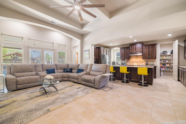 4438 Saddle Spur, San Antonio, TX 78253 - living area featuring a ceiling fan, a high ceiling, recessed lighting, healthy amount of natural light, and arched walkways