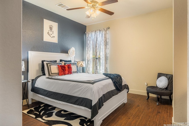 4438 Saddle Spur, San Antonio, TX 78253 - bedroom with wood finished floors, a textured wall, baseboards, and a ceiling fan