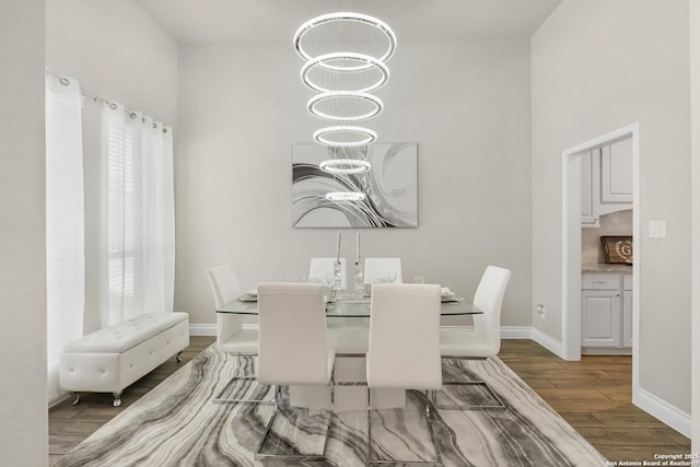 8823 Hideout, San Antonio, TX 78254 - dining room with wood finished floors and baseboards