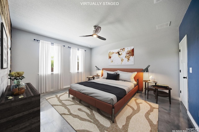 2060 Oedipus, San Antonio, TX 78245 - bedroom with a textured ceiling, baseboards, and ceiling fan