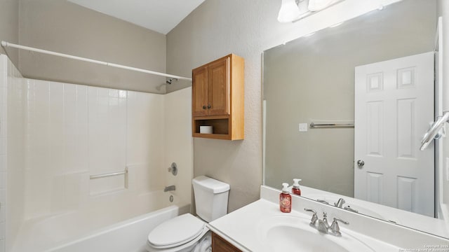 2253 Hidden Mdw, New Braunfels, TX 78130 - full bathroom featuring toilet, vanity, a textured wall, and shower / washtub combination
