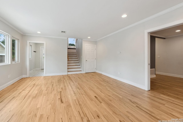 129 Elmview, Alamo Heights, TX 78209 - spare room featuring stairway, recessed lighting, ornamental molding, baseboards, and light wood-style floors