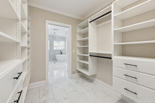 129 Elmview, Alamo Heights, TX 78209 - walk in closet featuring light marble finish floors