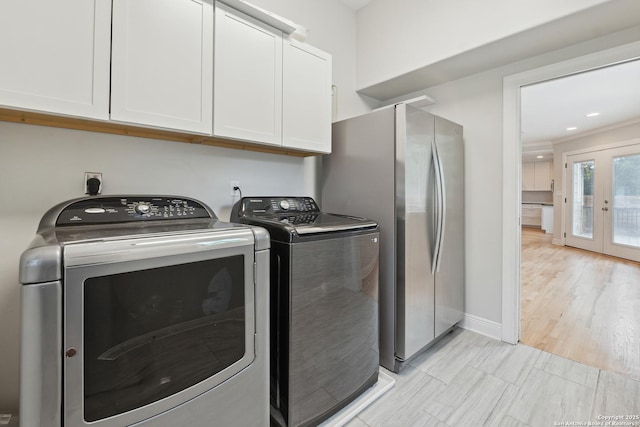 129 Elmview, Alamo Heights, TX 78209 - laundry area featuring cabinet space, washing machine and dryer, french doors, recessed lighting, and baseboards